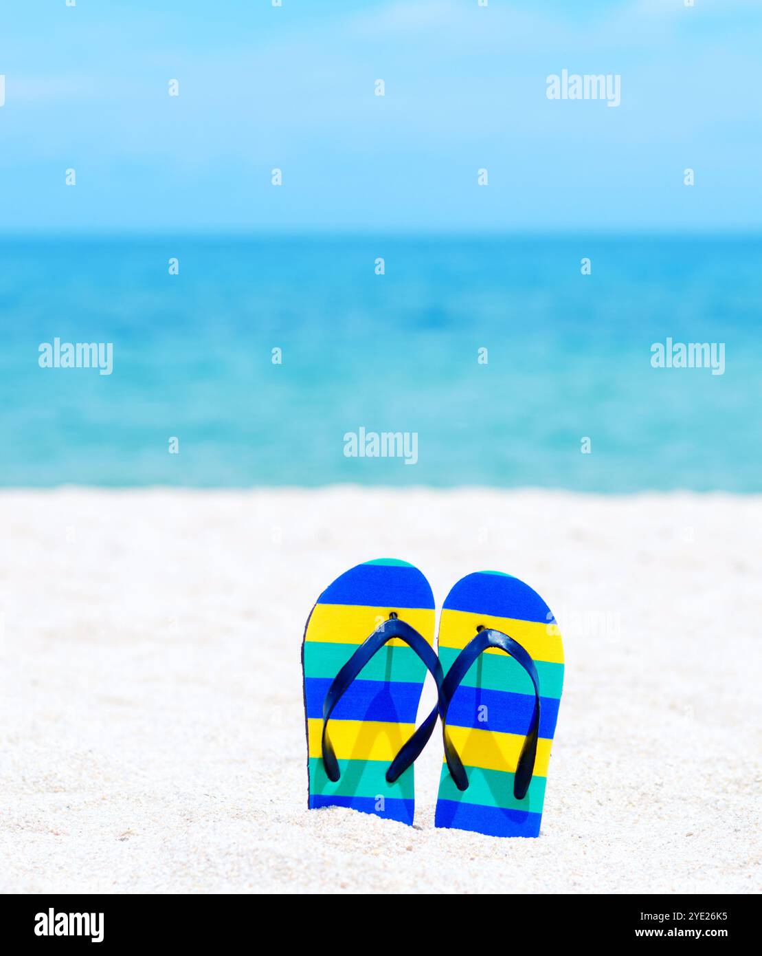 Flip flops on a tropical beach Stock Photo - Alamy