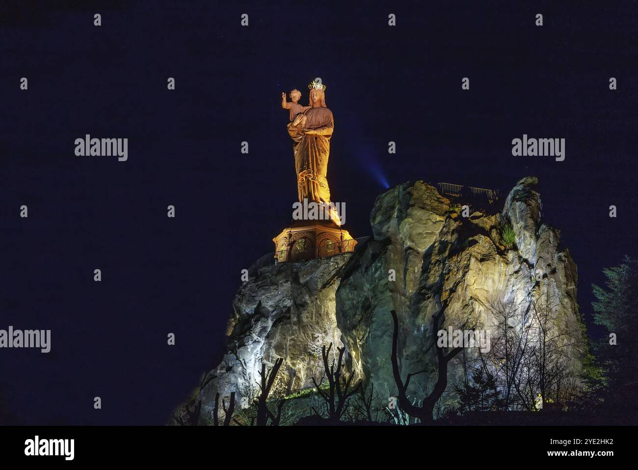 Statue of Notre-Dame de France in Le Puy-en-Velay, France. In night Stock Photo