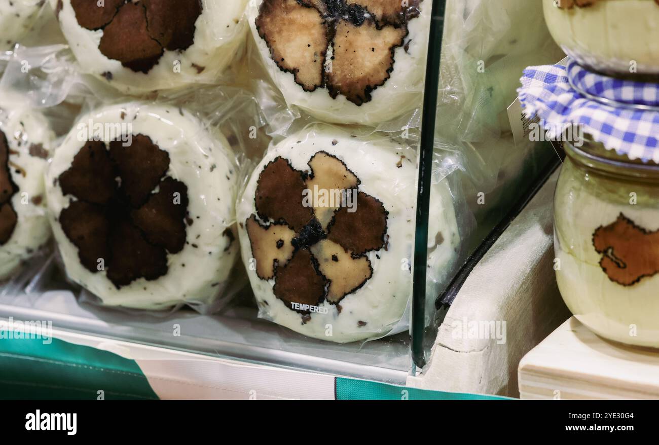At the Alba Truffle Festival in Italy, vendors display various truffle ...