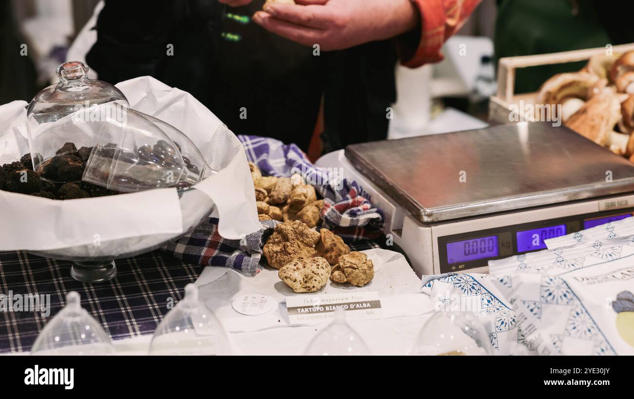 At the Alba Truffle Festival in Italy, attendees sample various ...