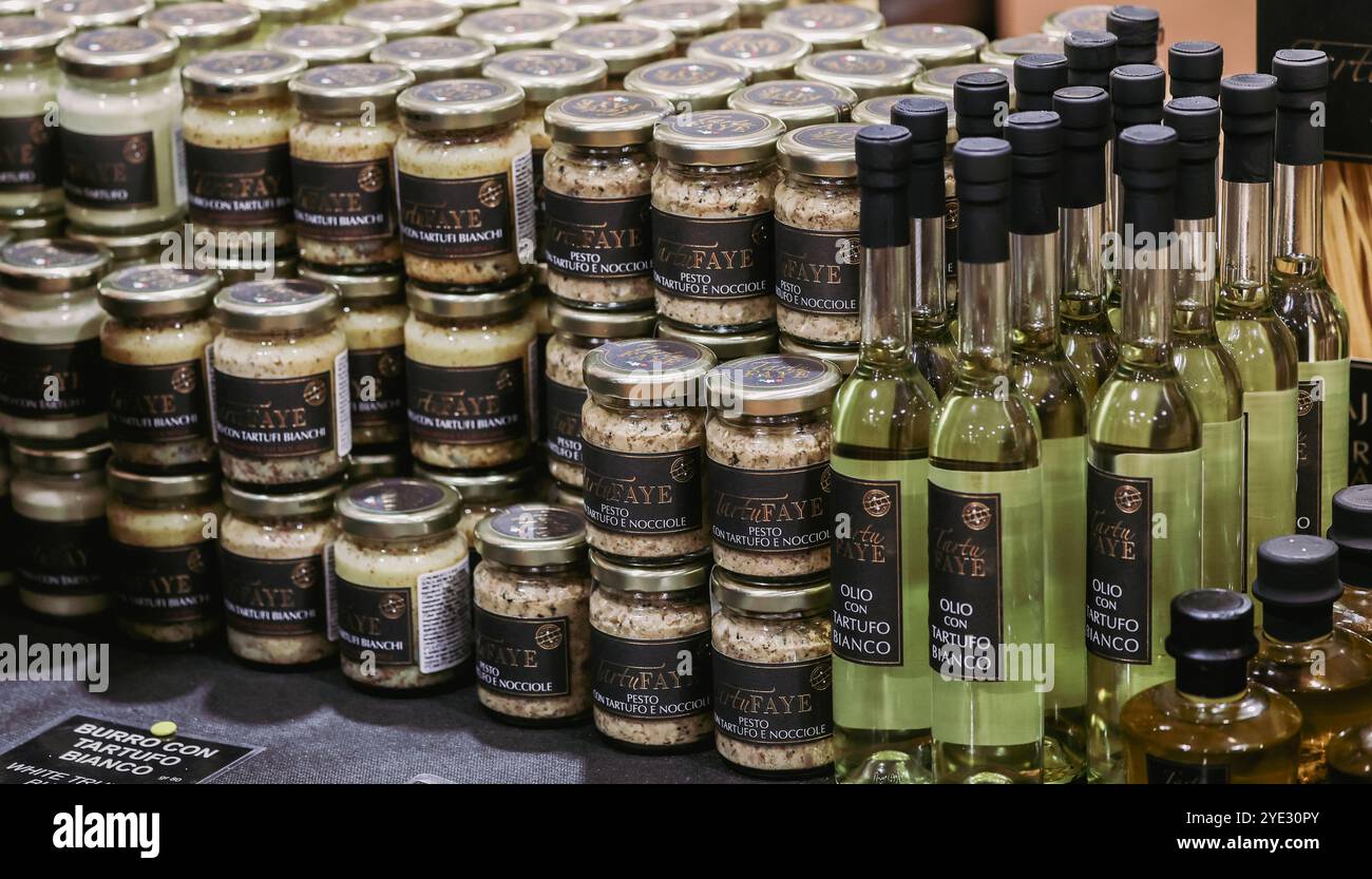 Visitors explore an array of gourmet products at the Alba Truffle ...
