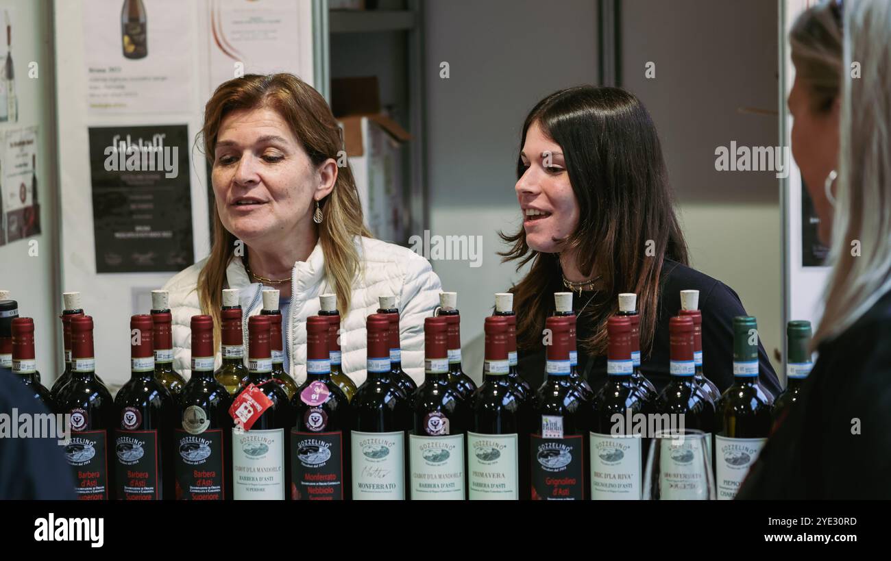 At the Alba Truffle Festival, attendees engage in wine tasting ...