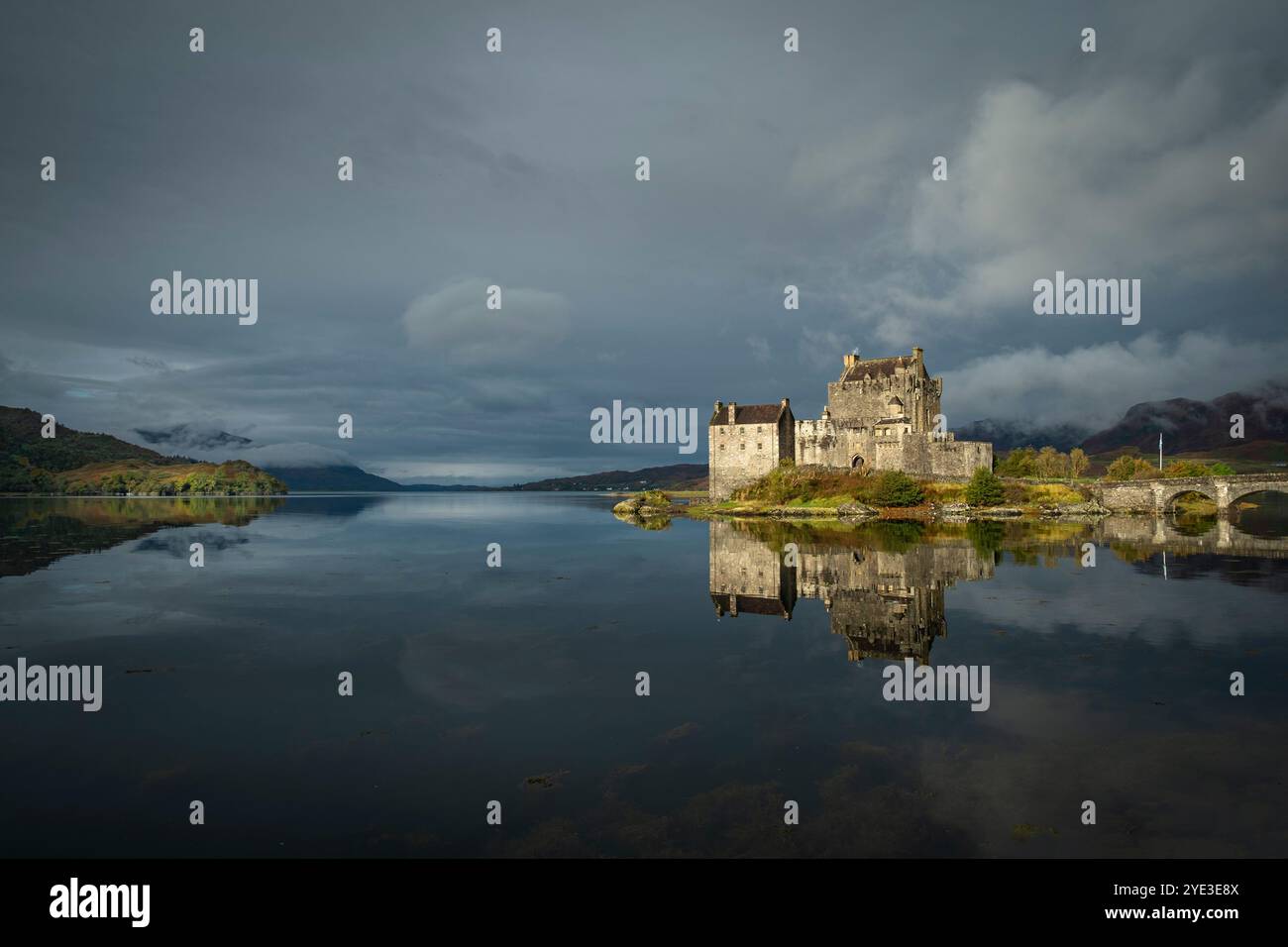 Eilean Donan Castle reflected in the still waters of Loch Alsh, Highlands, Scotland Stock Photo