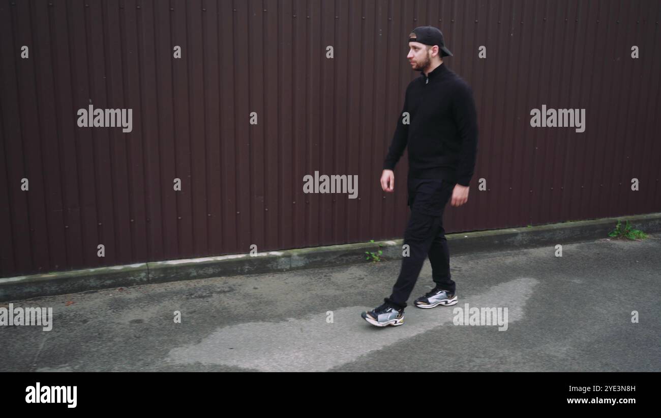 Black dressed man baseball cap hi-res stock photography and images - Alamy