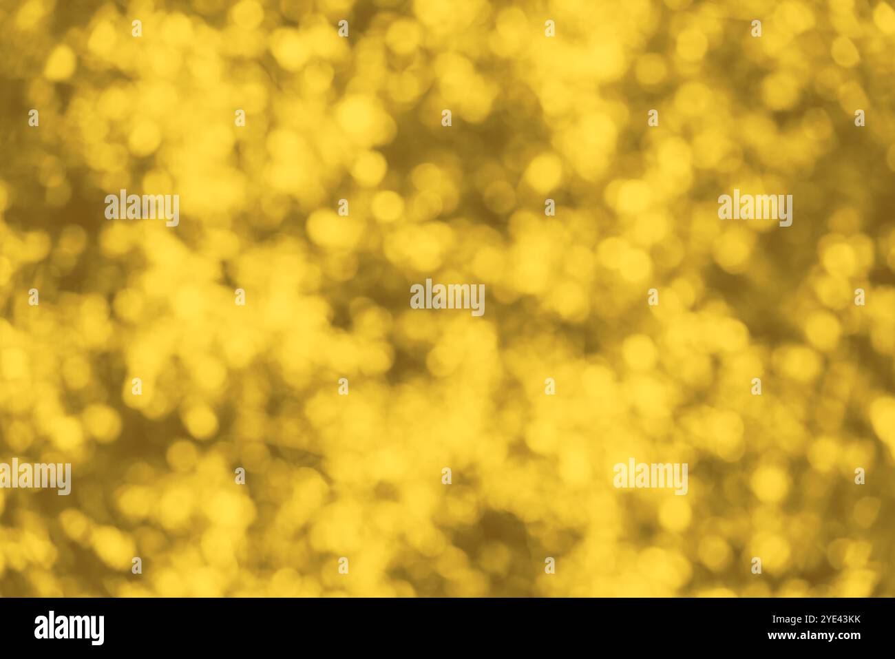 Abstract seamless blurred colorful golden gold texture or pattern bokeh background Stock Photo