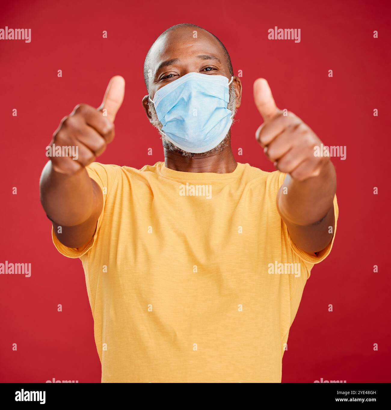 Black man, portrait and mask with thumbs up for protection or good ...
