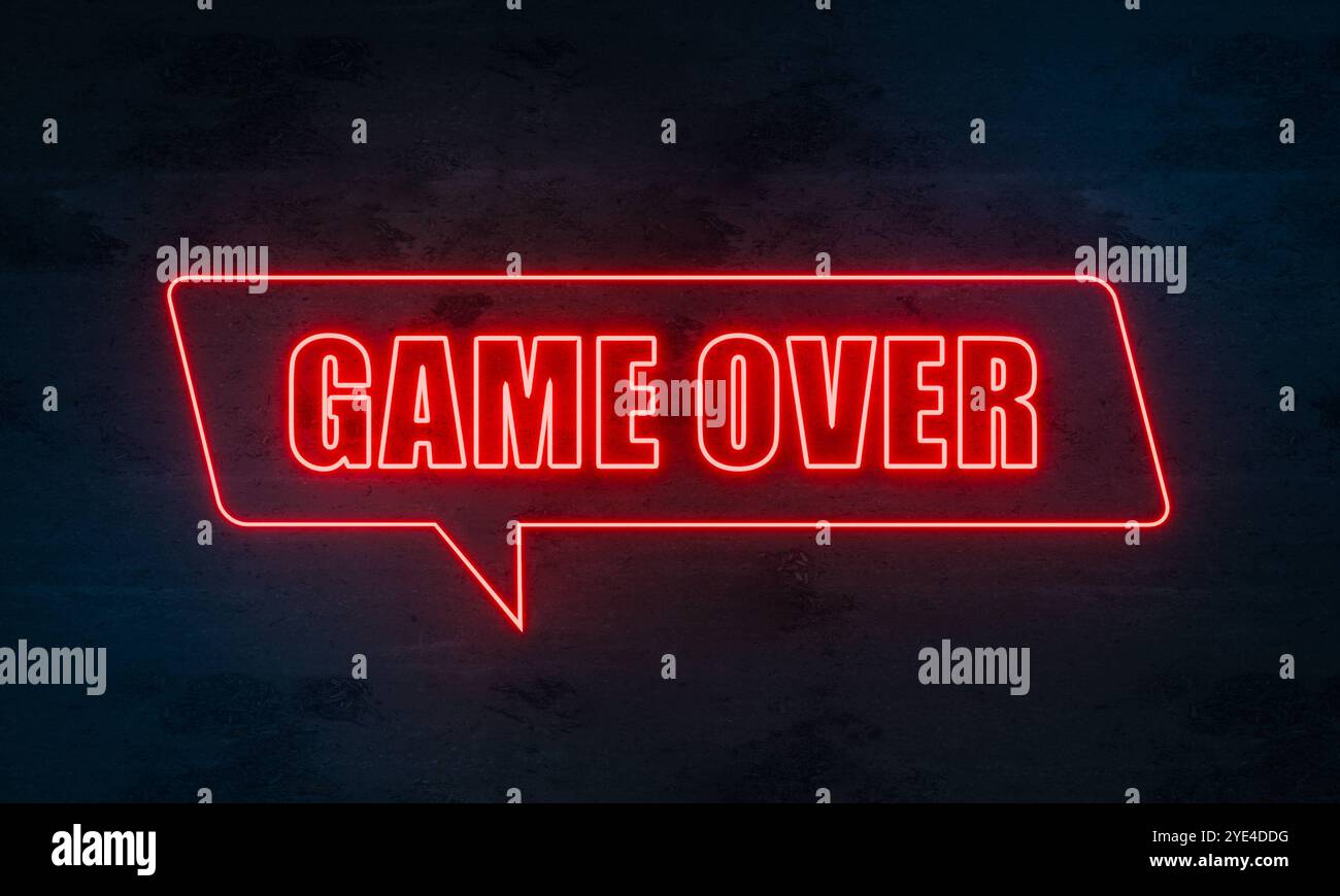 Game Over Game Over. Illuminated neon sign in red on a dark concrete ...