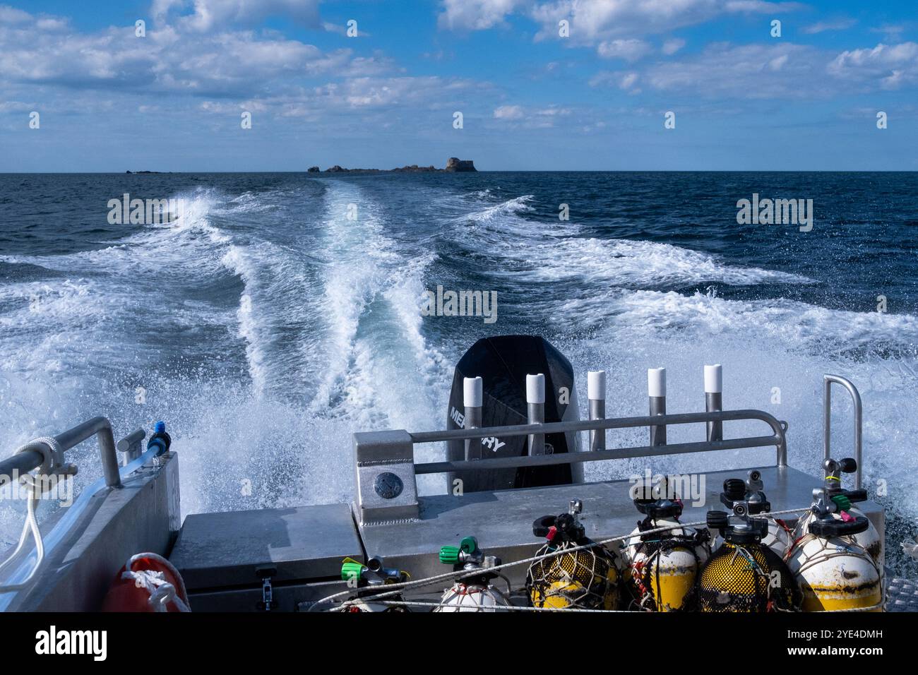 Scallop fisherman scuba diving on the boat in the bay of Saint-Malo in the Ille-et-Vilaine department in the Brittany region of France on 29 April 202 Stock Photo