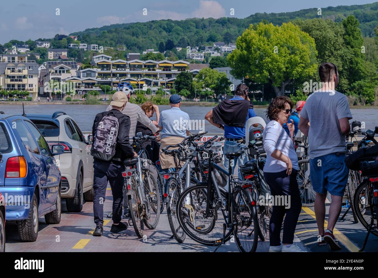 Bonn-Bad Godesberg, Germany - May 21, 2024 : View of a small ferry boat transporting people, cars and bicycles in Bad Godesberg Germany Stock Photo