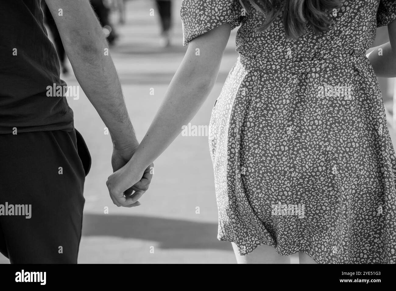 Black couple embrace holding Black and White Stock Photos & Images - Alamy