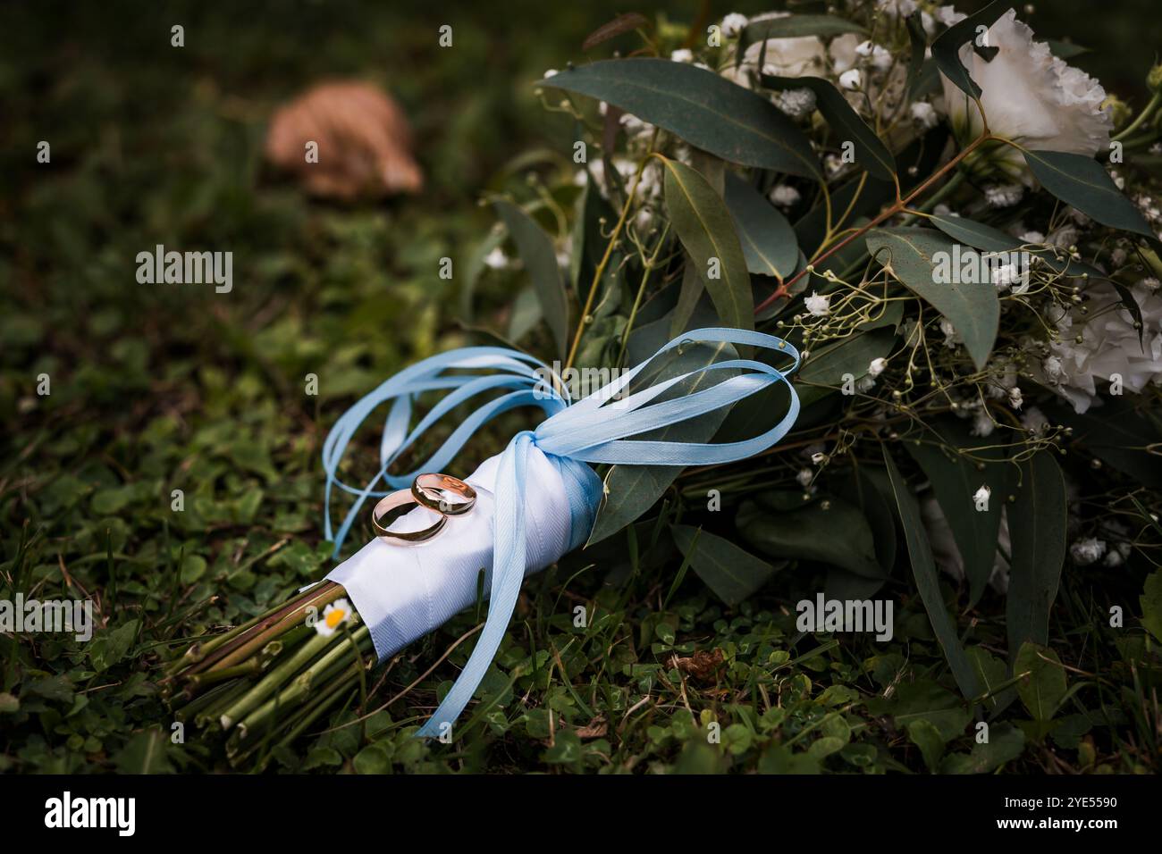 Blue wedding rings on hand hi-res stock photography and images - Alamy