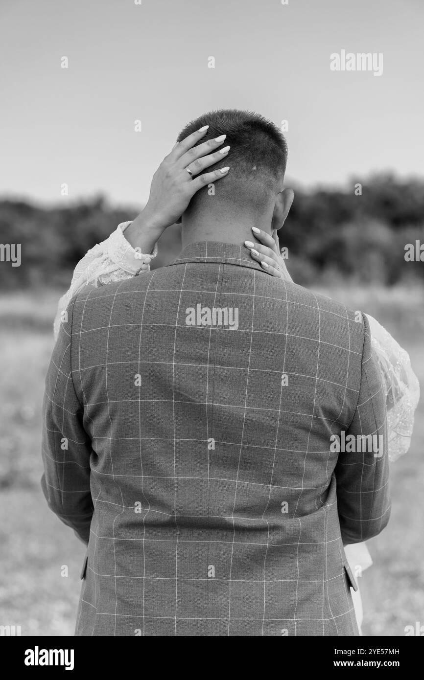 Intimate Embrace: A Romantic Connection in Nature. Stock Photo
