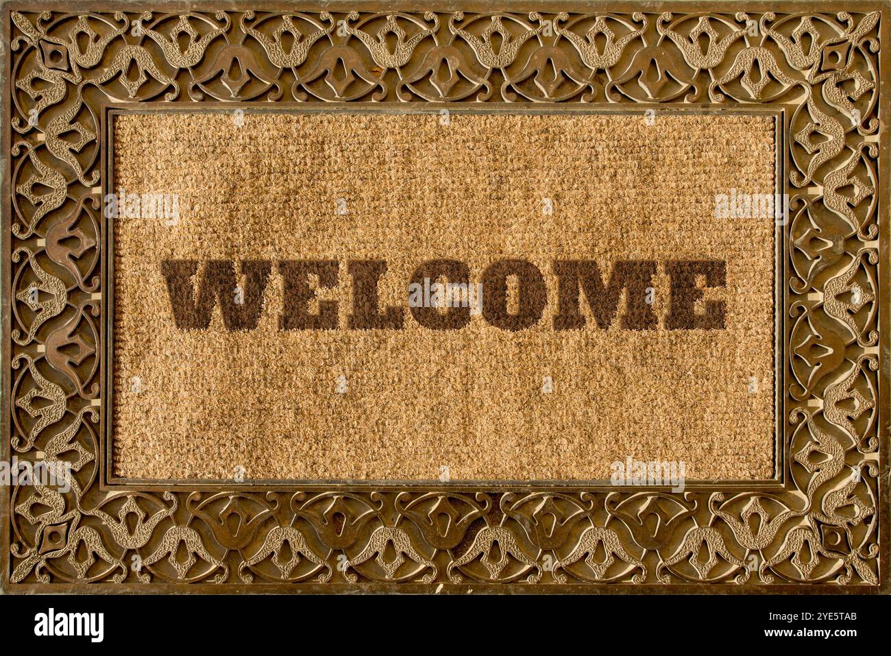 Rug for entrance with Welcome caption and beautiful ethnic ornaments on ...