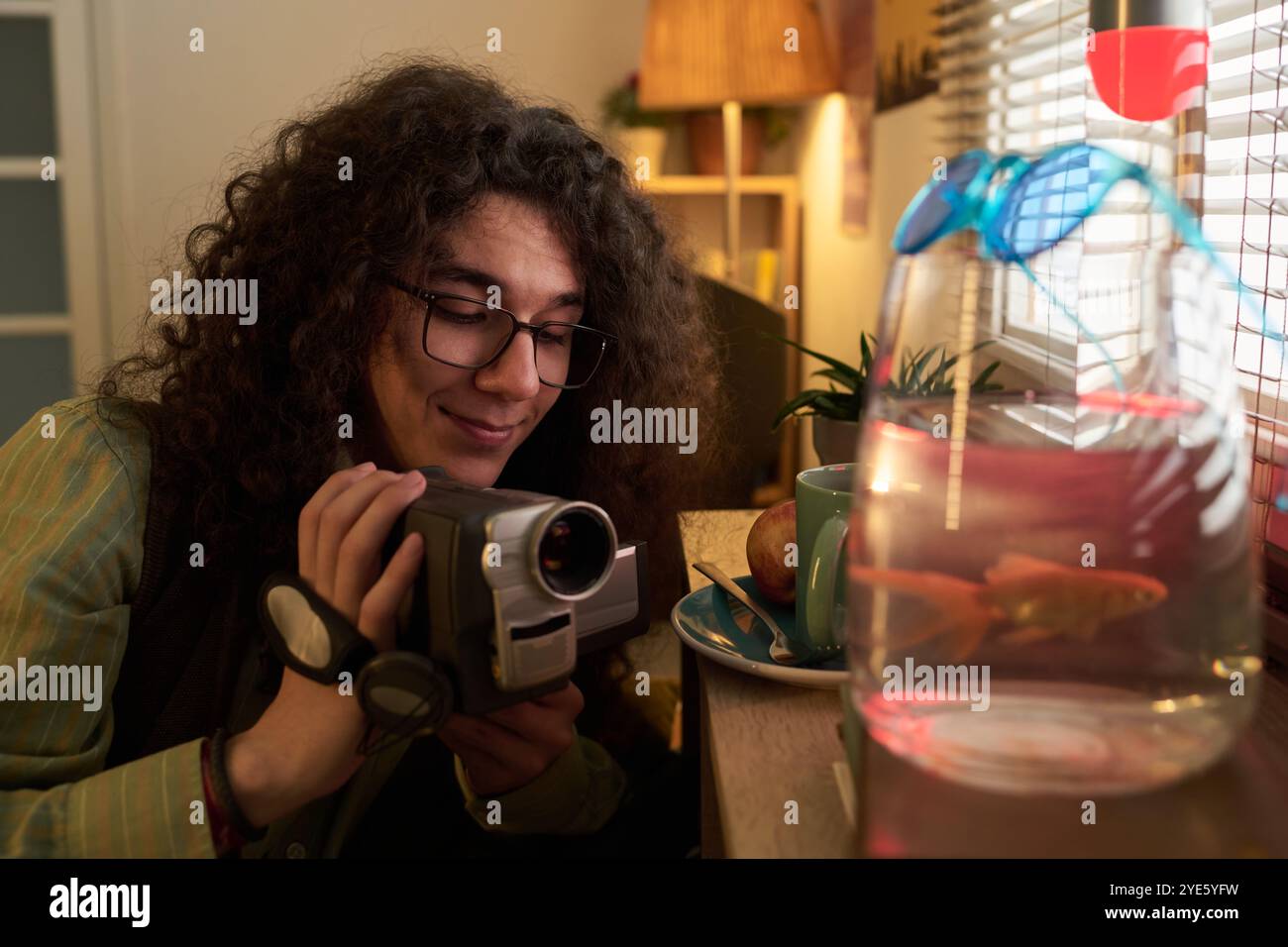 Woman curly hair glasses hi-res stock photography and images - Alamy