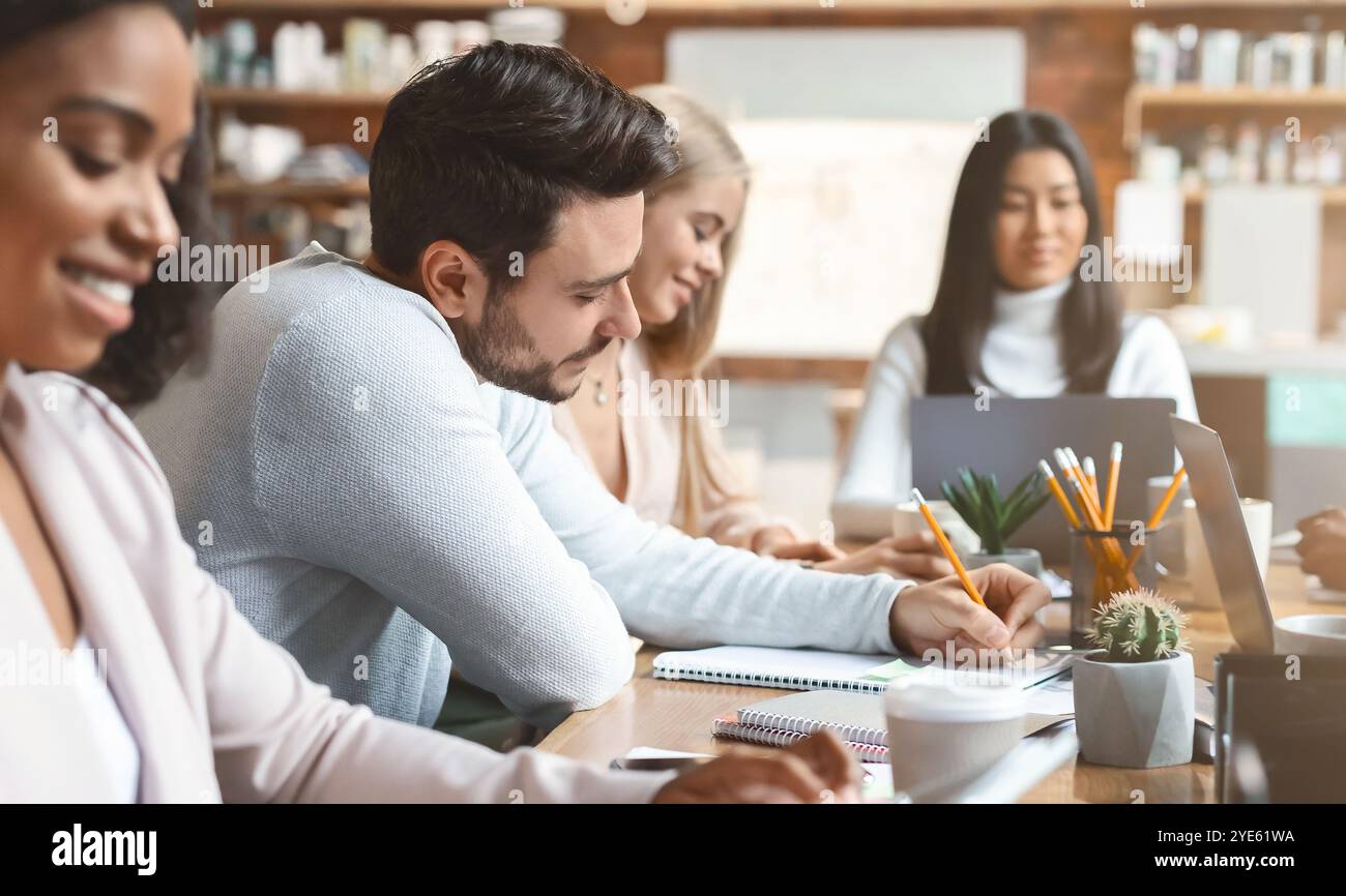 Working process of young multiracial business team Stock Photo