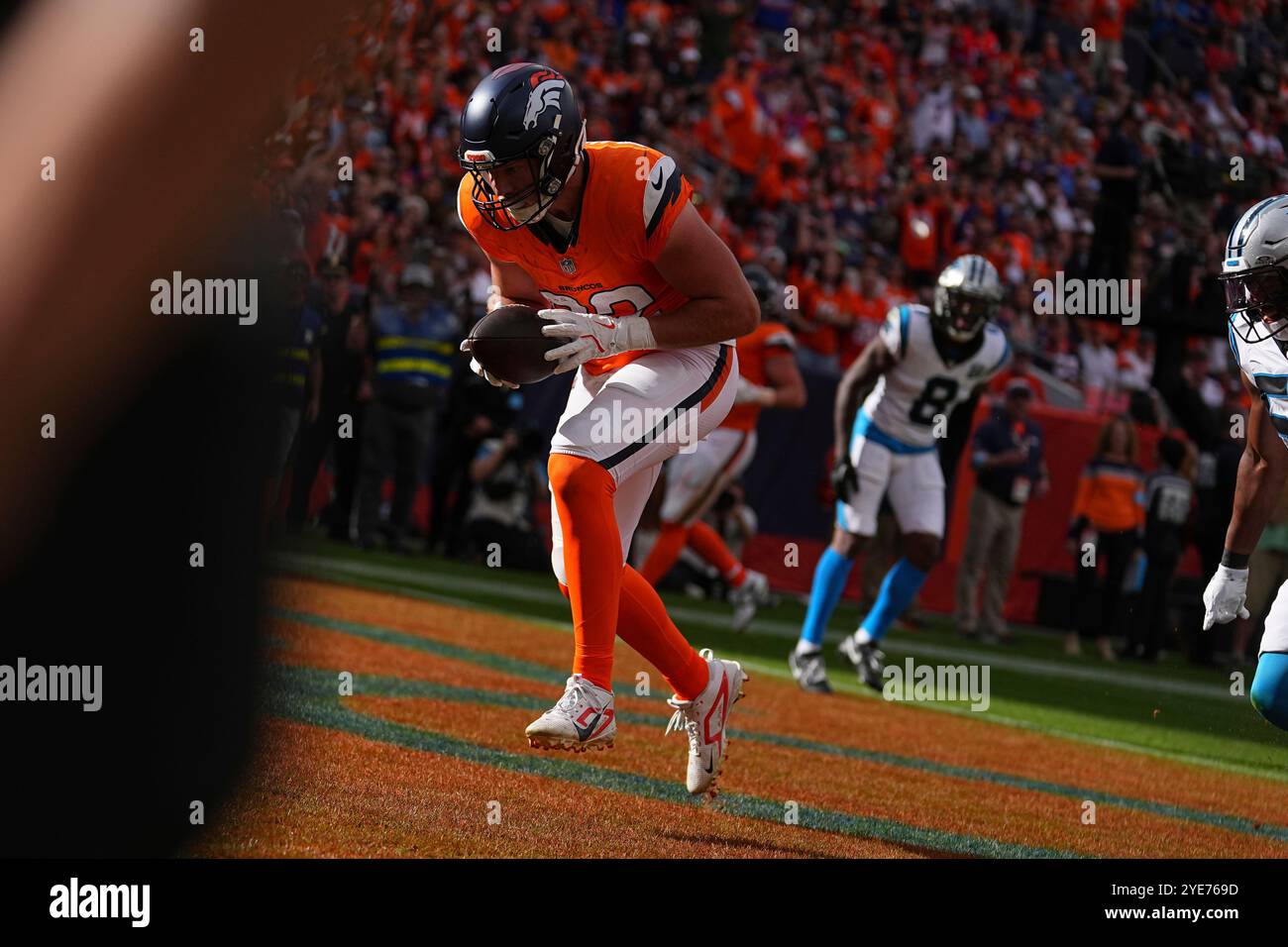Denver Broncos tight end Adam Trautman (82) catches a pass for a ...