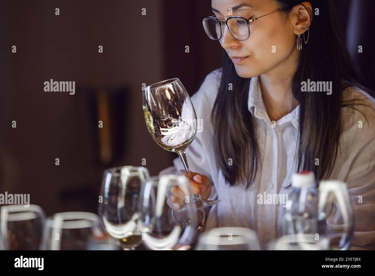 Woman holding glass of wine hi-res stock photography and images - Alamy