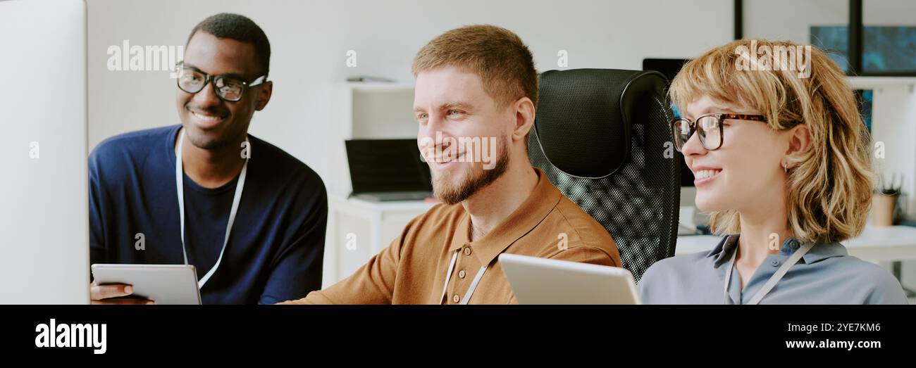 Group of Developers Working In Office Website Header Stock Photo