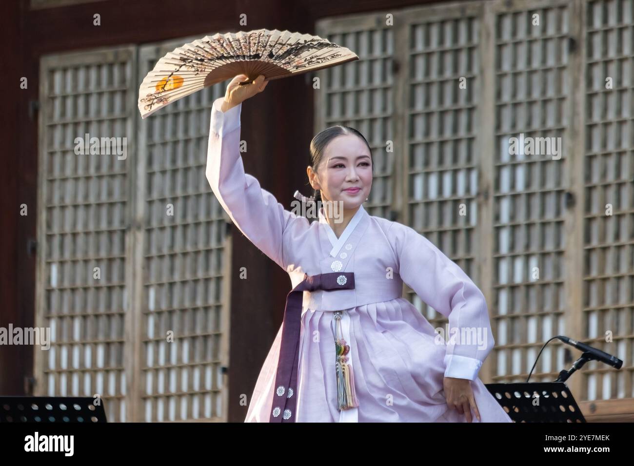 Korean woman dancer wearing traditional Korean clothing hanbok and a ...