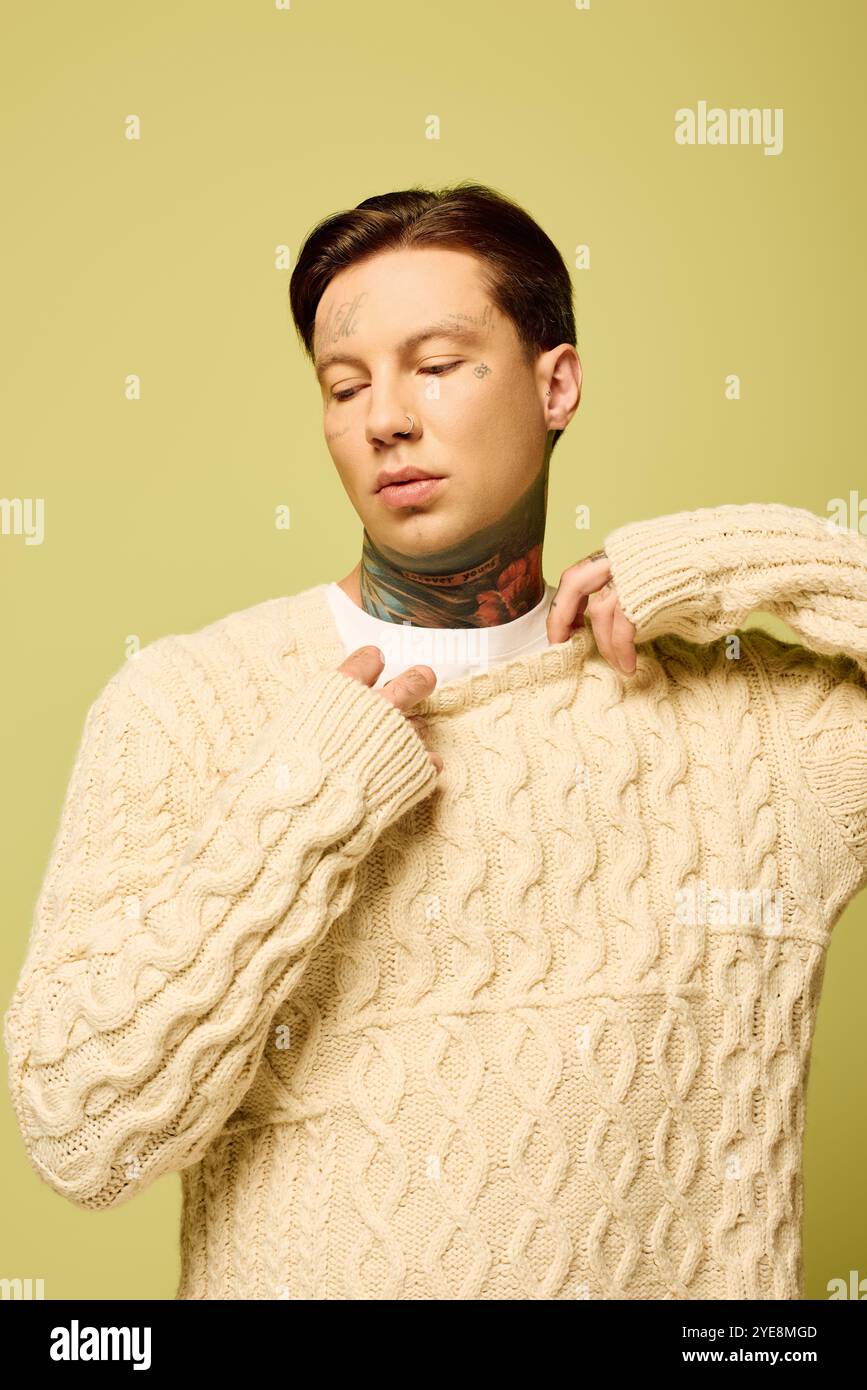 Young man tattoos adjusts hi-res stock photography and images - Alamy