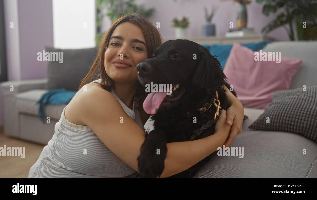Woman hugging a labrador puppy hi-res stock photography and images - Alamy