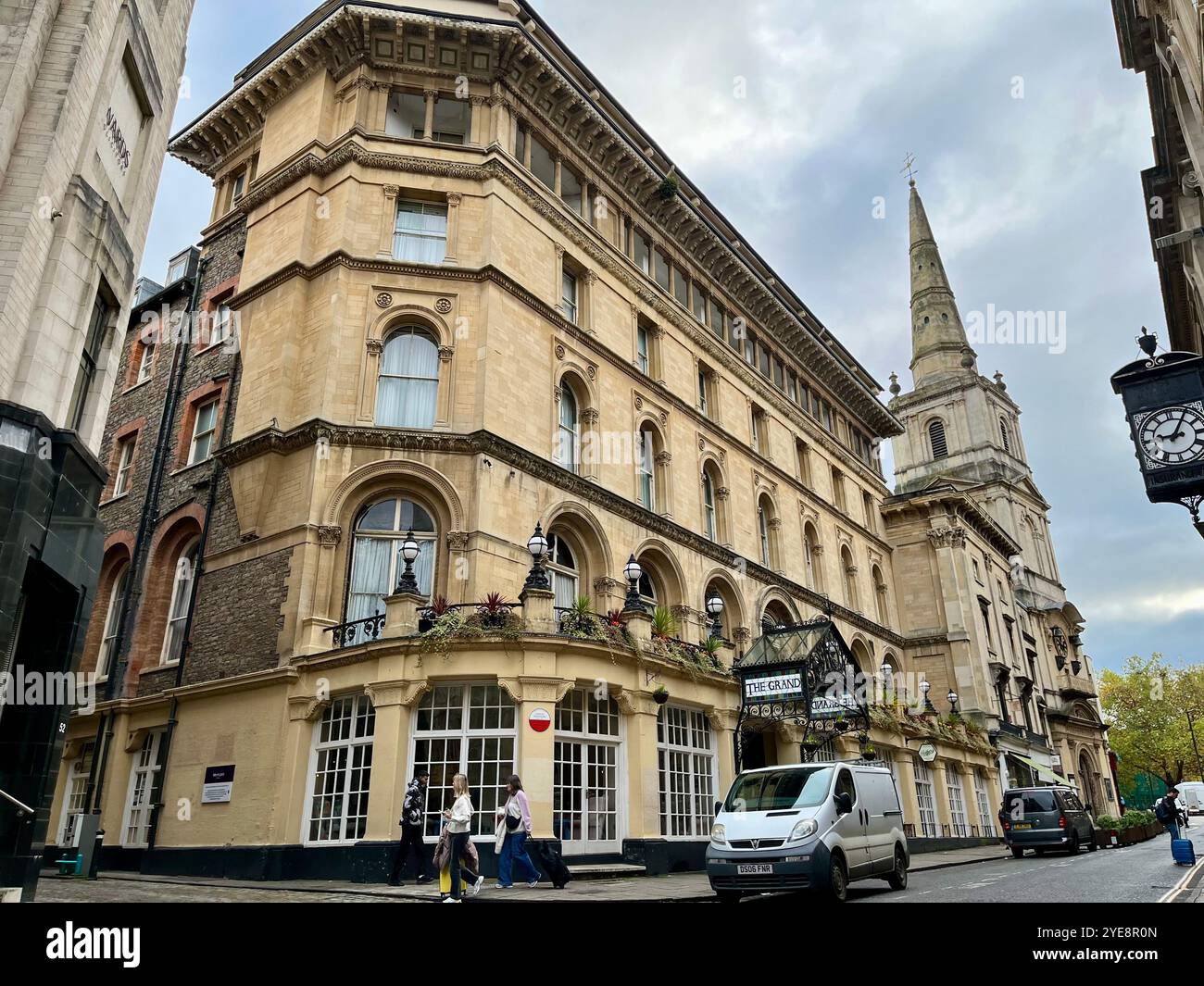 The Mercure Bristol Grand Hotel and Christ Church on Broad Street. Bristol, England, United Kingdom. 29th October 2024. - Smartphone Captured Stock Image