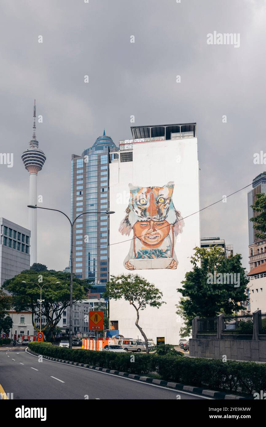 Road, artwork and architecture in Kuala Lumpur, Malaysia; Kuala Lumpur, Malaysia Stock Photo