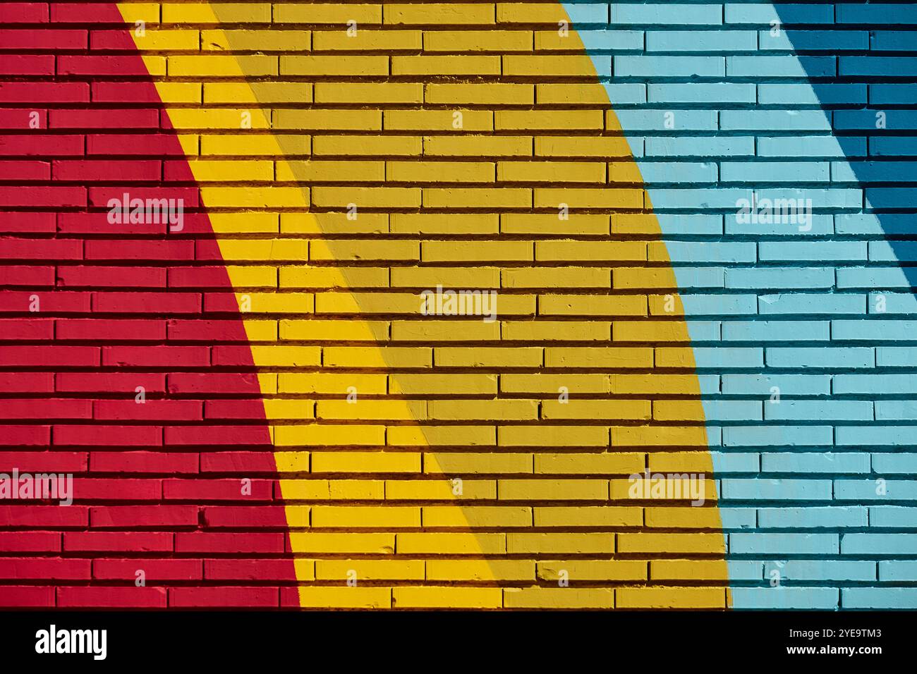 Multi colored abstract textured background. Colored brick wall backdrop Stock Photo