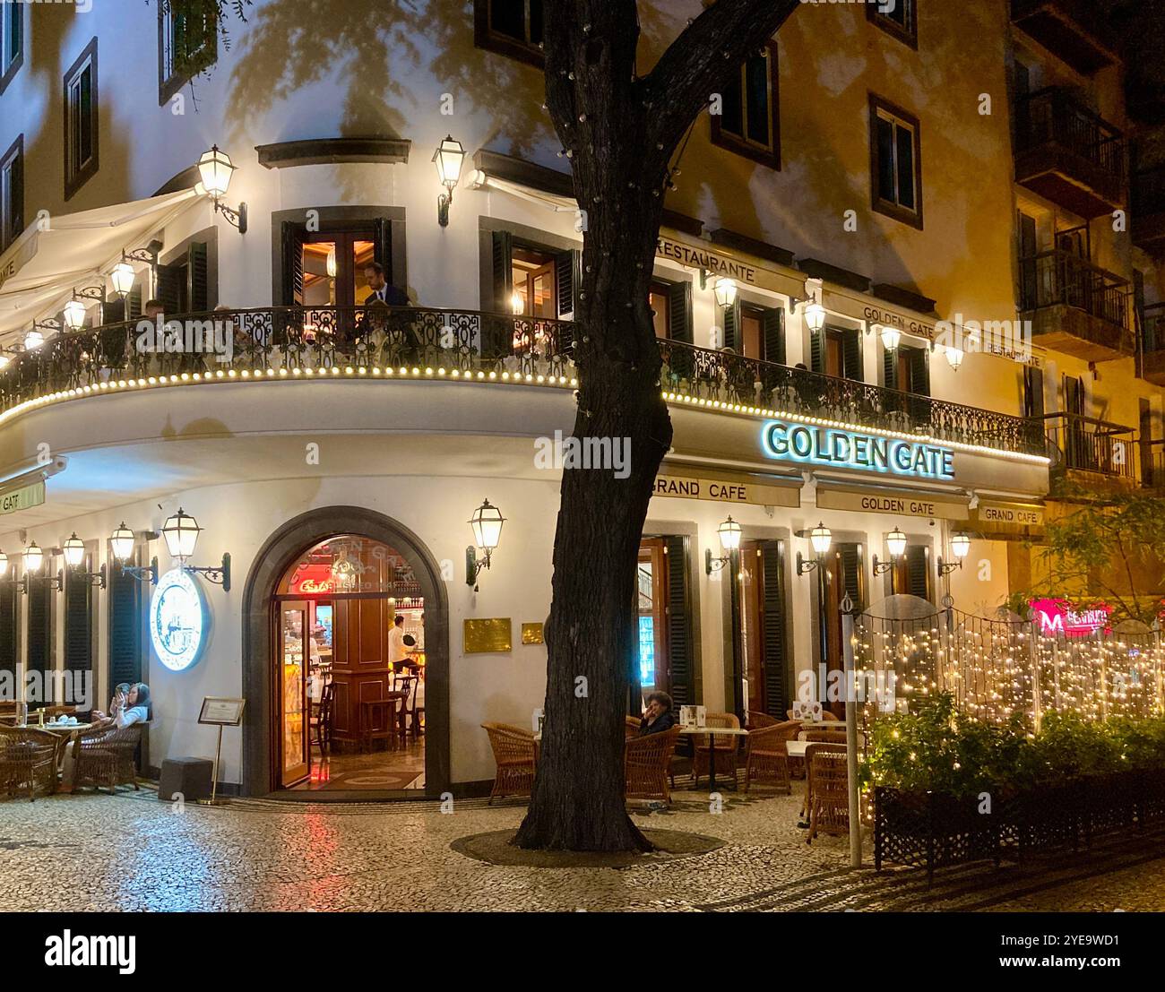 The Golden Gate Grand Cafe in Funchal, Madeira at night. - Smartphone Captured Stock Image