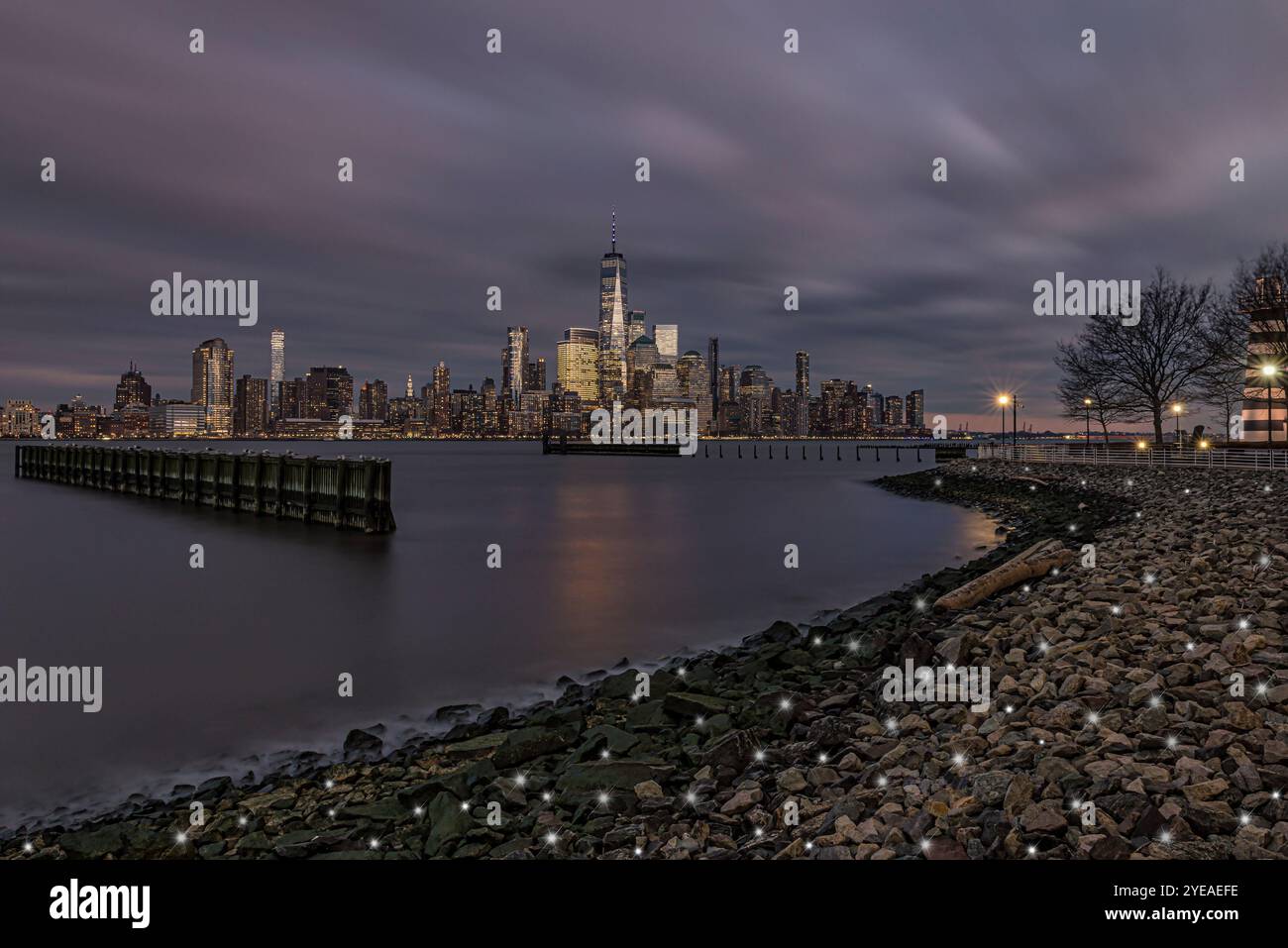 Lower manhattan skyline dusk clouds hi-res stock photography and images ...