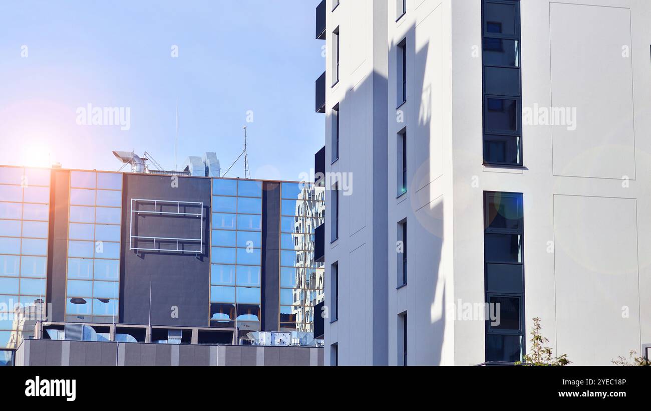 Curated visual reference: Modern High Rise Apartment Building In White Stand Tall Against Photo Inspiration