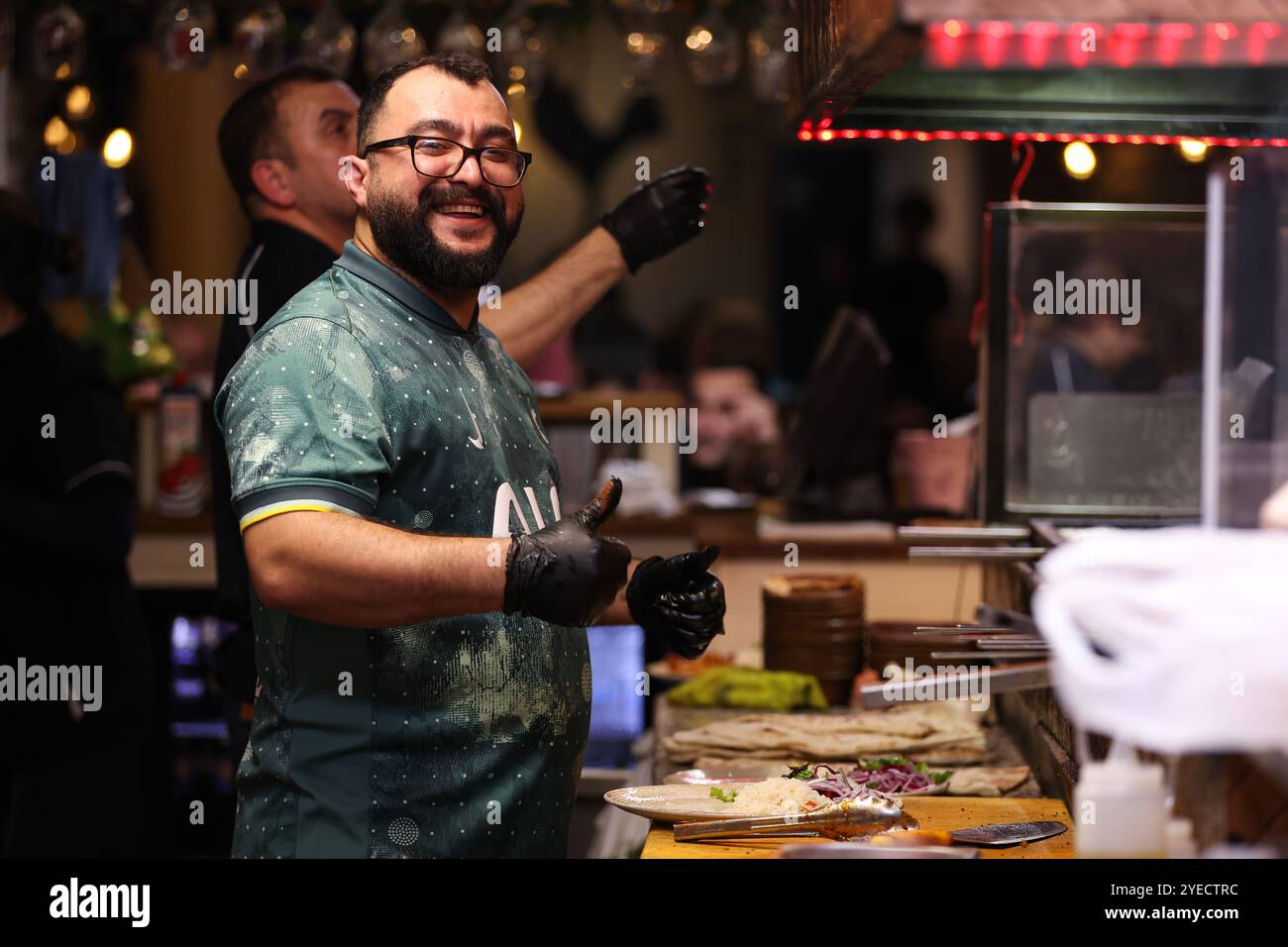 London, UK. 30th Oct, 2024. A Tottenham fan inside a restaurant opposite the ground before the Carabao Cup match at the Tottenham Hotspur Stadium, London. Picture credit should read: Kieran Cleeves/Sportimage Credit: Sportimage Ltd/Alamy Live News Stock Photo