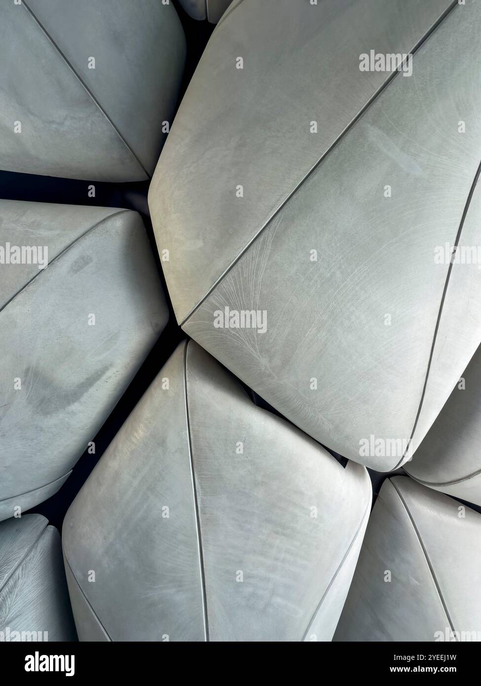 Abstract geometric pattern of large concrete panels architectural feature with intricate surface details underneath little island manhattan new york - Smartphone Captured Stock Image