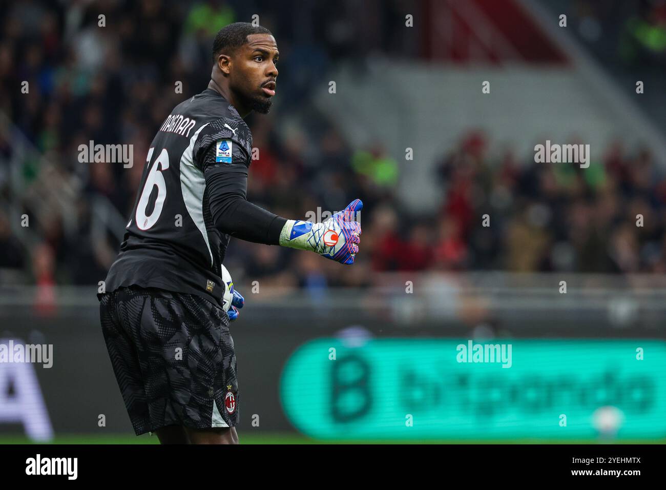Mike Maignan of AC Milan gestures during Serie A 2024/25 football match ...