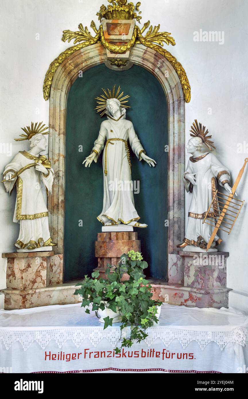 Side altar with Jesus and two figures of saints in the Roman Catholic Church of St Verena, Bad Wurzach, Allgaeu, Baden-Wuerttemberg, Germany, Europe Stock Photo