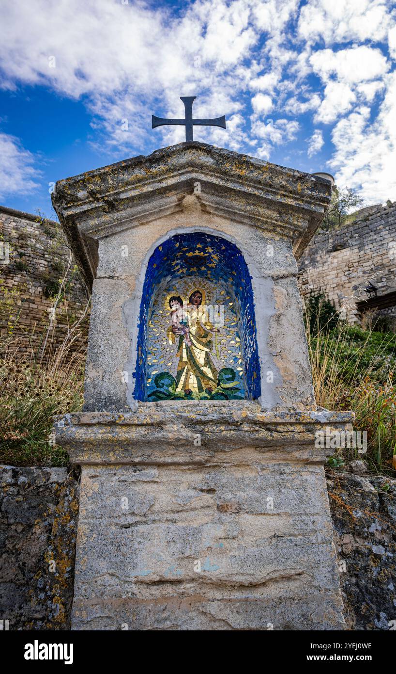 Mosaic artwork of the Virgin Mary with the baby Jesus in a roadside shrine, La Garenne, 84330 Le Barroux, France. Stock Photo