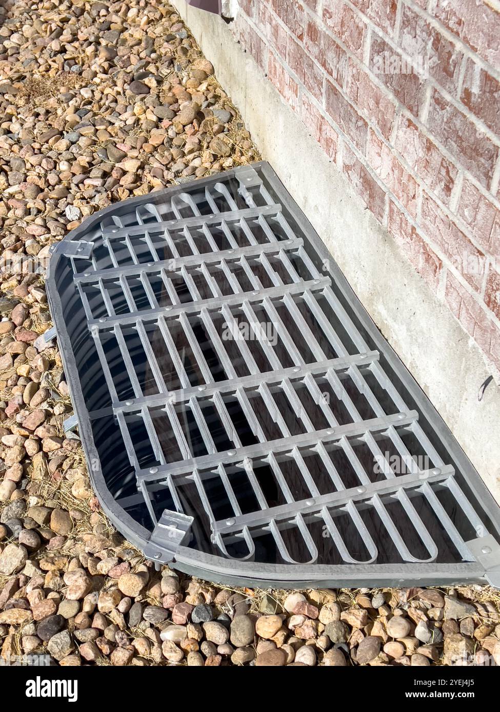 Basement Window Well Cover with Custom Plexiglass Top Stock Photo - Alamy