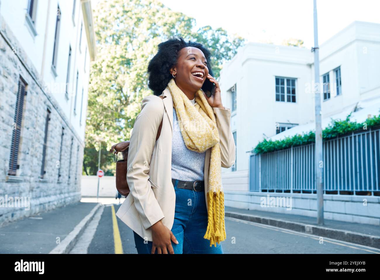 Happy black woman walking street hi-res stock photography and images ...