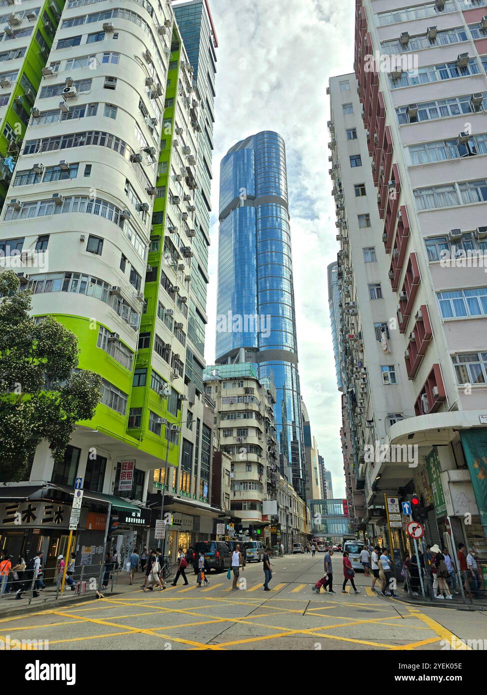 Old residential buildings with the Langham place tower in-between. Mong Kok, Kowloon, Hong Kong. - Smartphone Captured Stock Image
