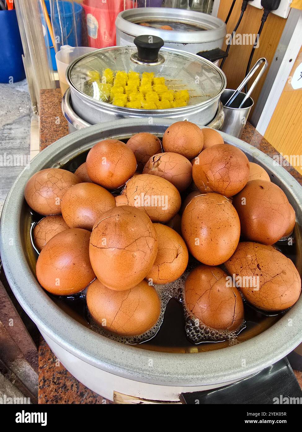 Chinese tea eggs sold at a little shop in Mong Kok, Kowloon, Hong Kong. - Smartphone Captured Stock Image