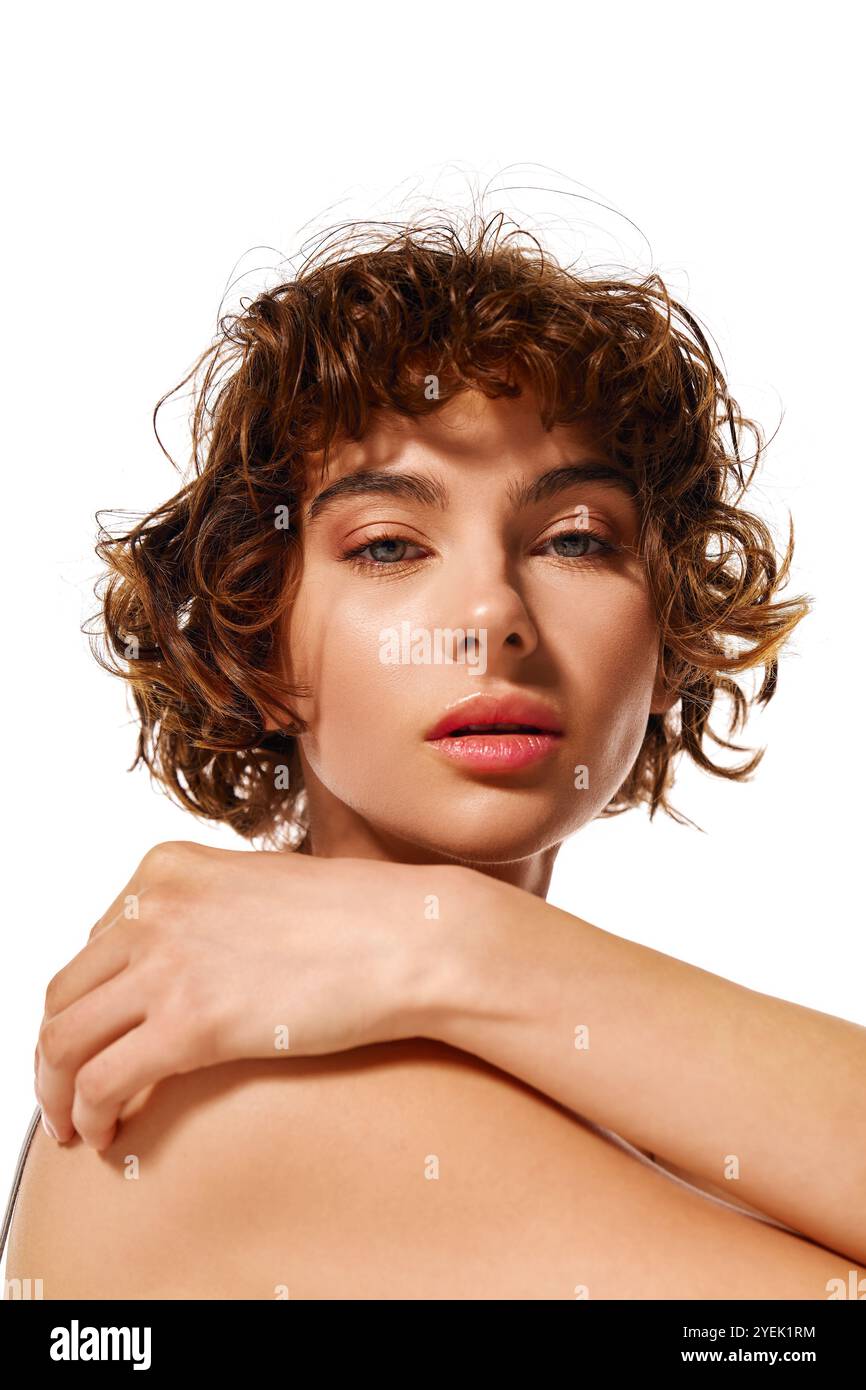 Woman curly hair embraces herself hi-res stock photography and images ...