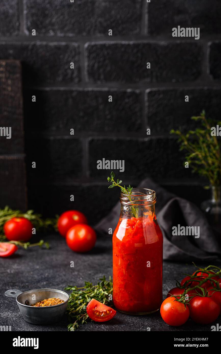 Homemade tomato sauce in glass bottle Stock Photo - Alamy