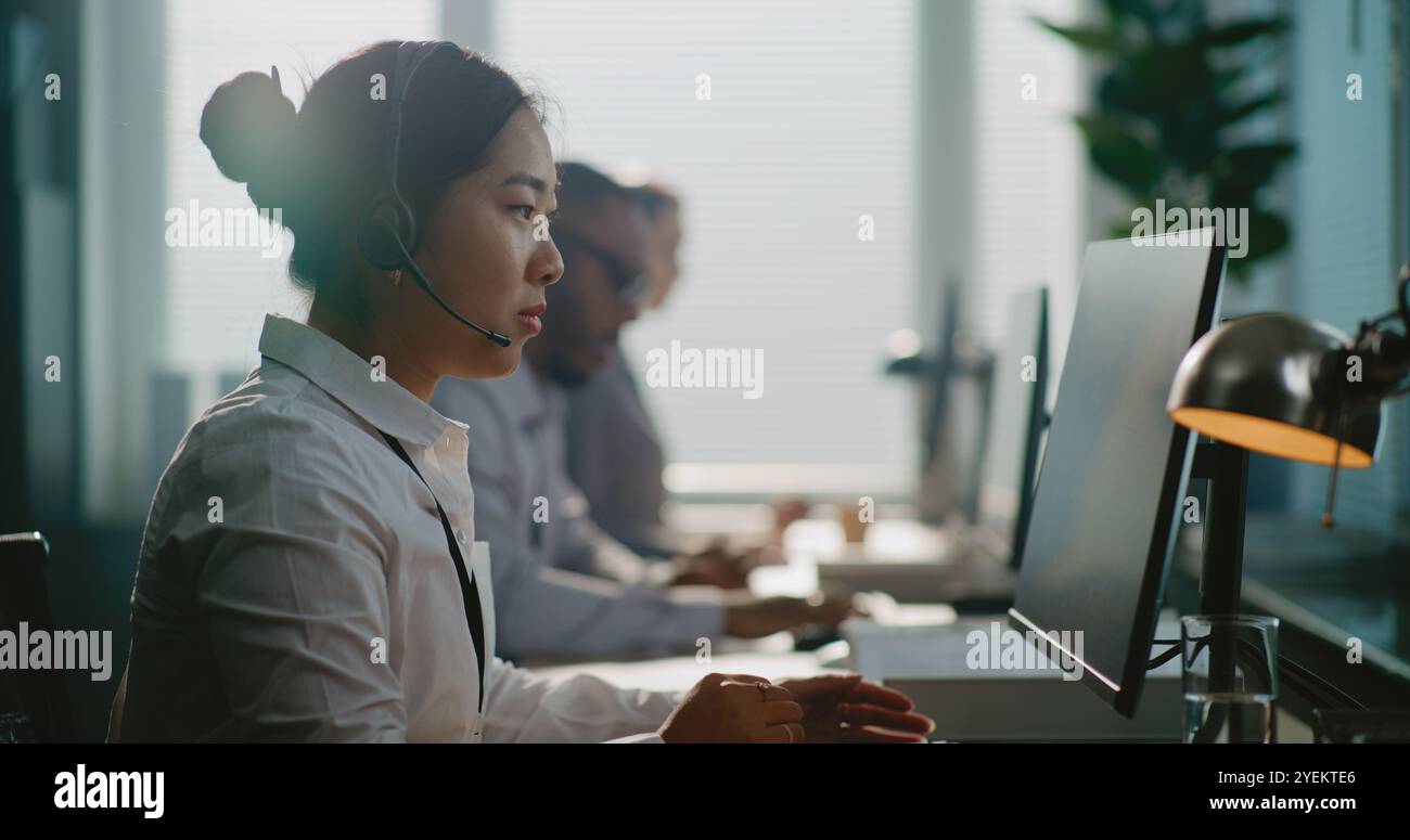 Side view helpline operators hi-res stock photography and images - Alamy