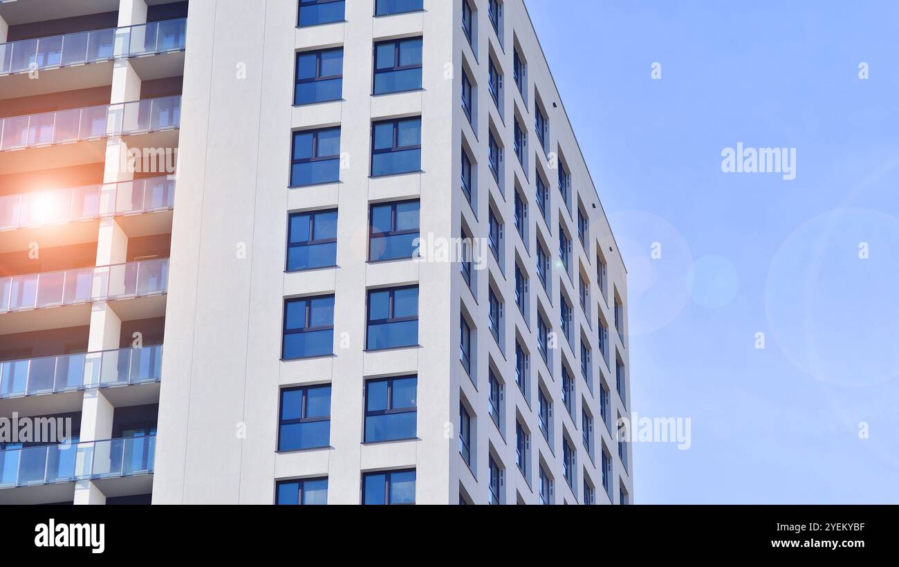 Photo inspiration: Fresh Look at Modern High Rise Apartment Building In White Stand Tall Against