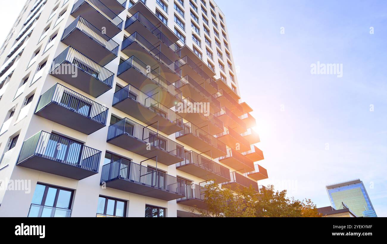 Photo inspiration: Visual Reference: Modern High Rise Apartment Building In White Stand Tall Against
