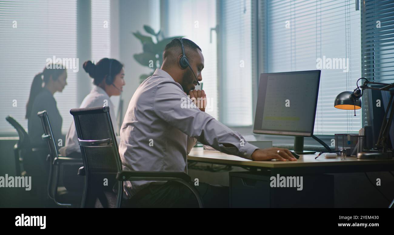 Side view helpline operators hi-res stock photography and images - Alamy