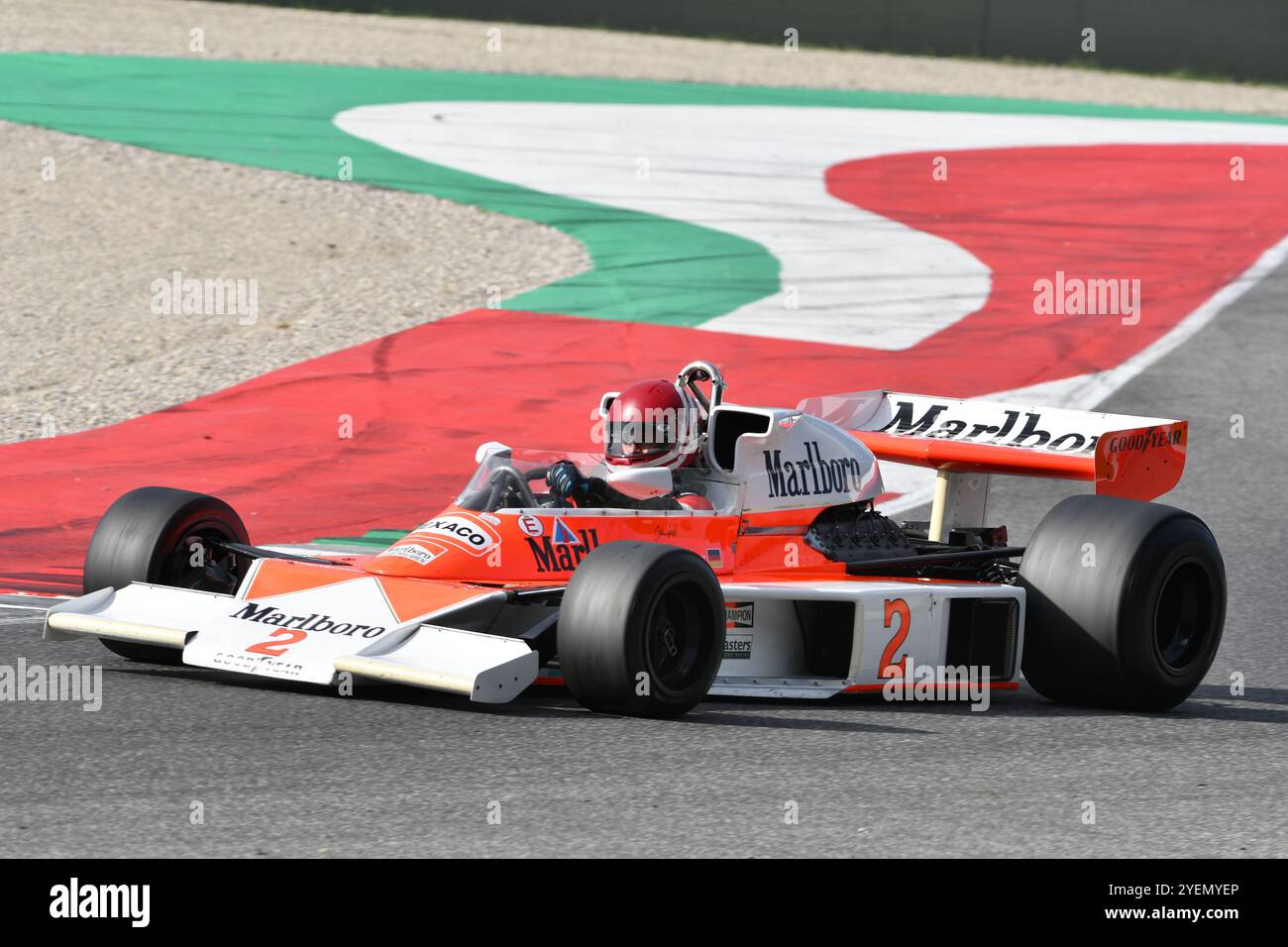 Scarperia, Italy - October 12th 2024: McLaren M23 of year 1976 ex Johen Mass and James Hunt drive by unknown in action during practice session at Muge Stock Photo