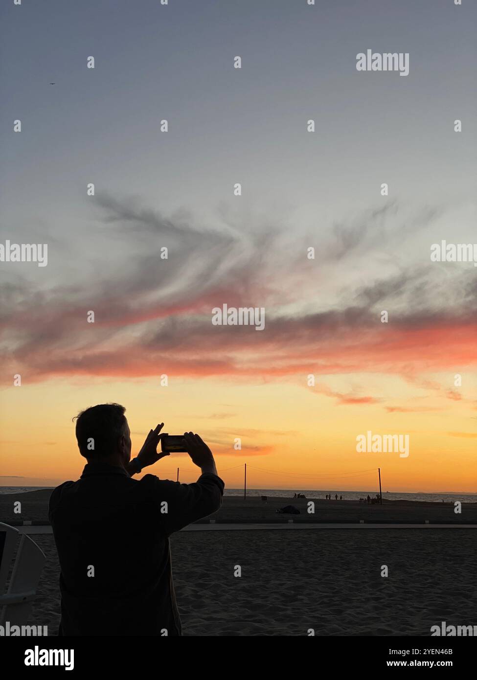 photographing the sunset - Smartphone Captured Stock Image