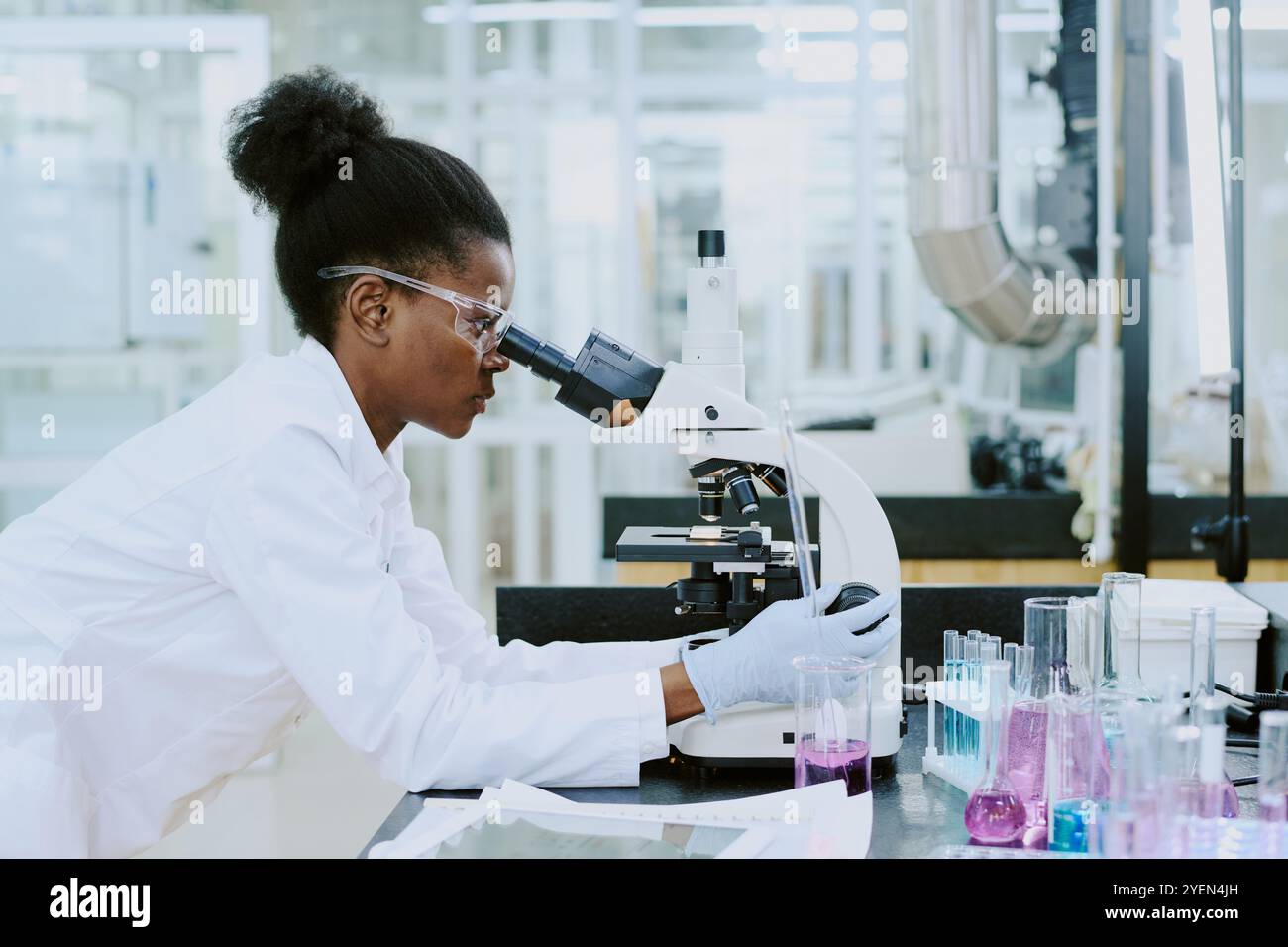 Scientist using microscope in lab hi-res stock photography and images ...