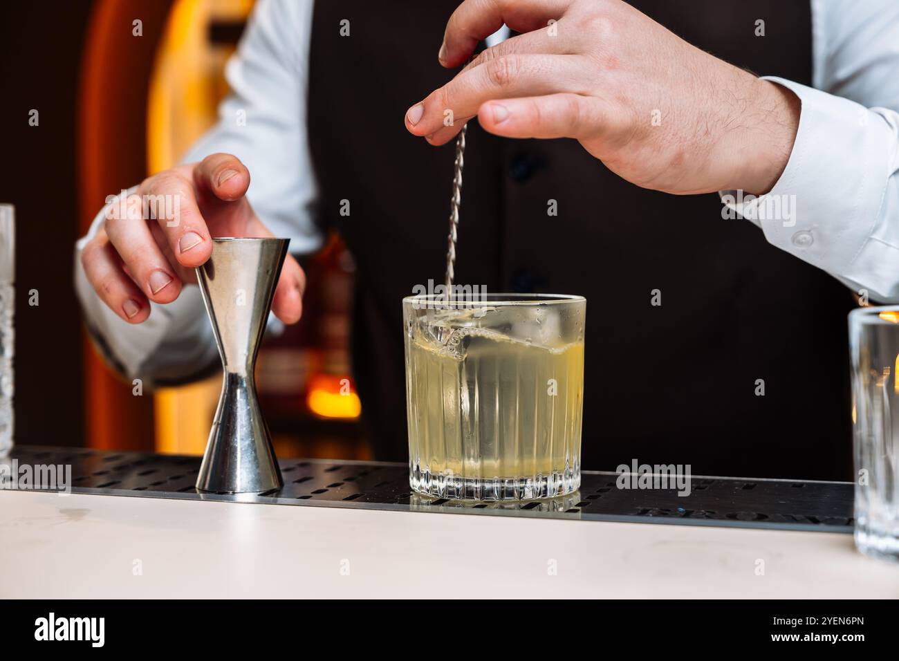 Bartender mixing preparing cocktails hi-res stock photography and ...
